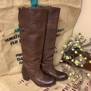 Frye Jane tall cuff boots.